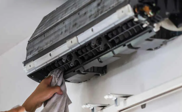 Services - team performing coil cleaning